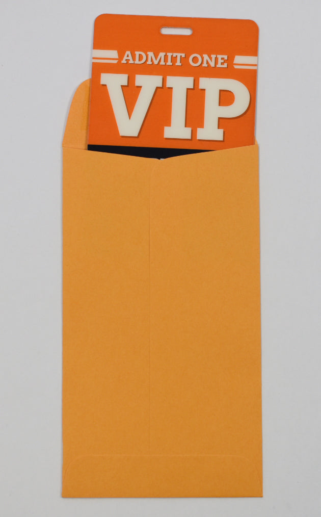 A brown kraft coin envelope with a VIP pass sticking out of the open top.