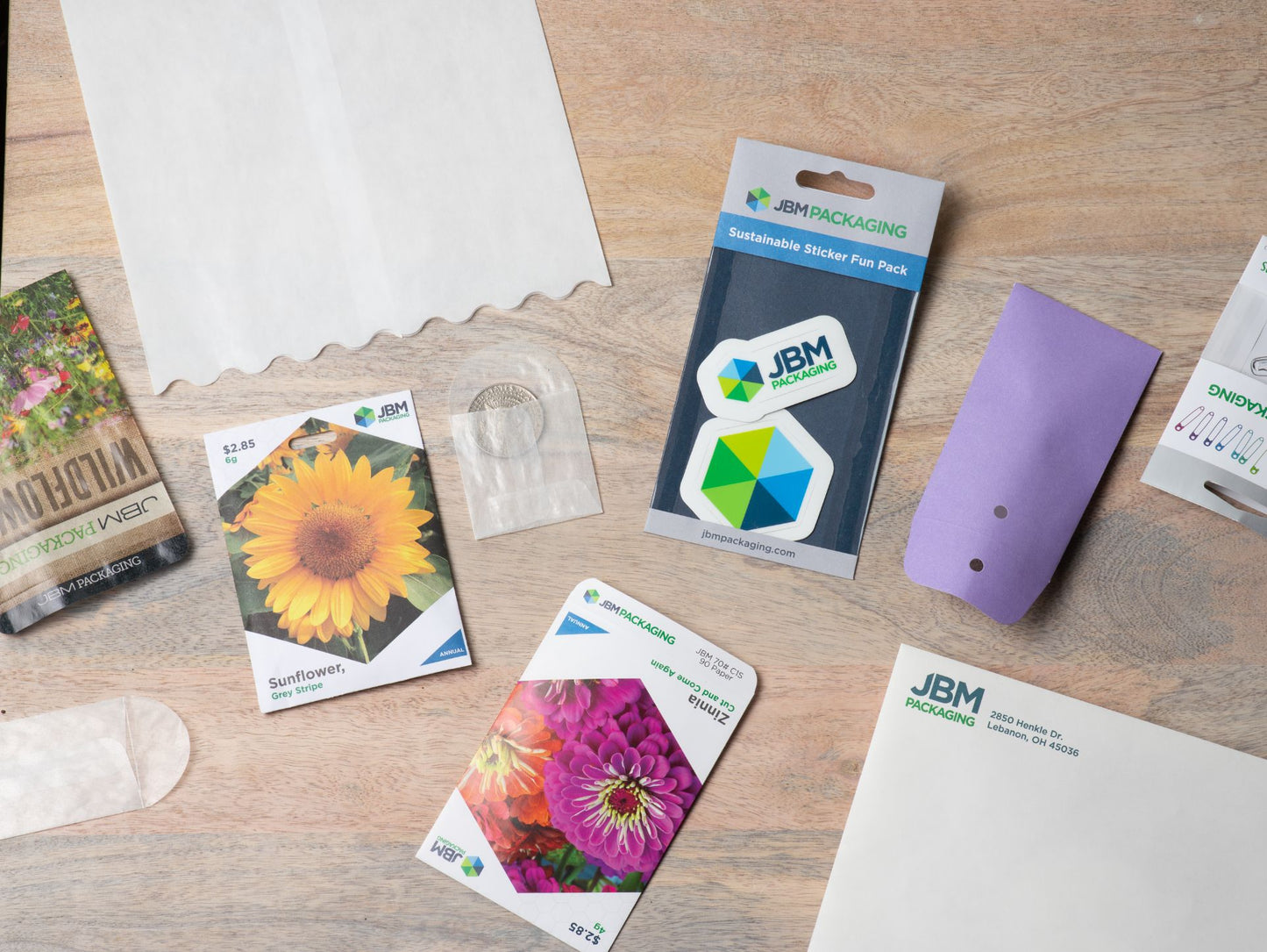  Variety of different JBM Packaging products including seed packets, glassine sheets, and envelopes.