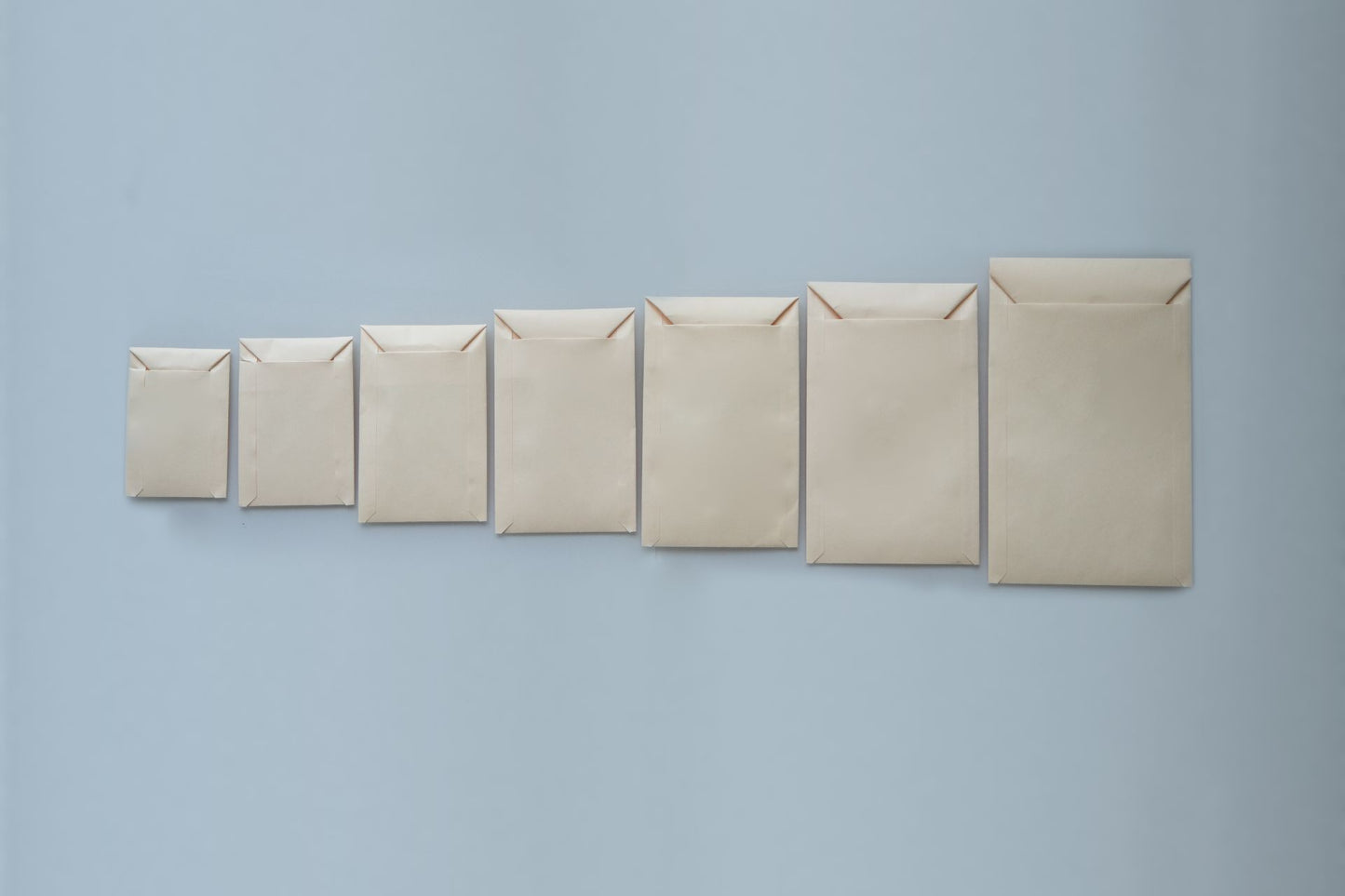 Various sizes of spear envelopes displayed side by side. 